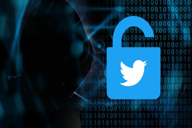 Imagen de hacker con capucha y candado abierto con el logo de Twitter